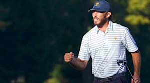 Max Homa celebrates after making a putt at the 2022 Presidents Cup.